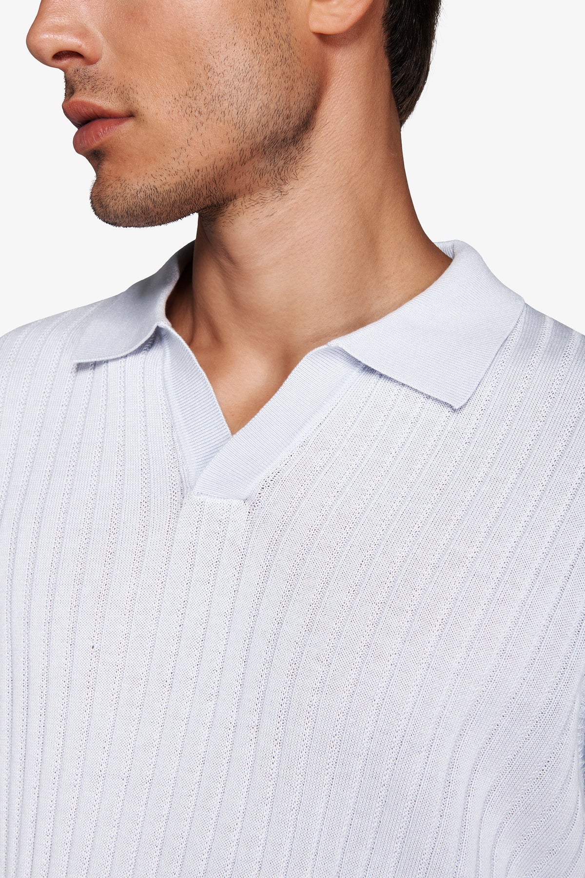 Polo in maglia collo aperto costa piatta celeste