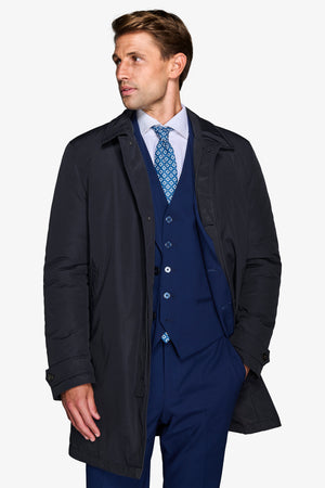 Blue quilted trench coat