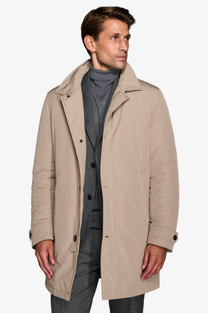 Beige quilted trench coat