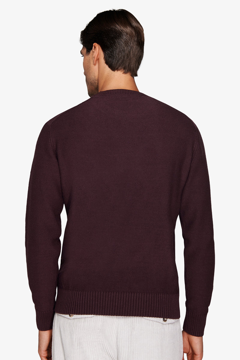 Pull bordeaux col rond, point torsadé placé