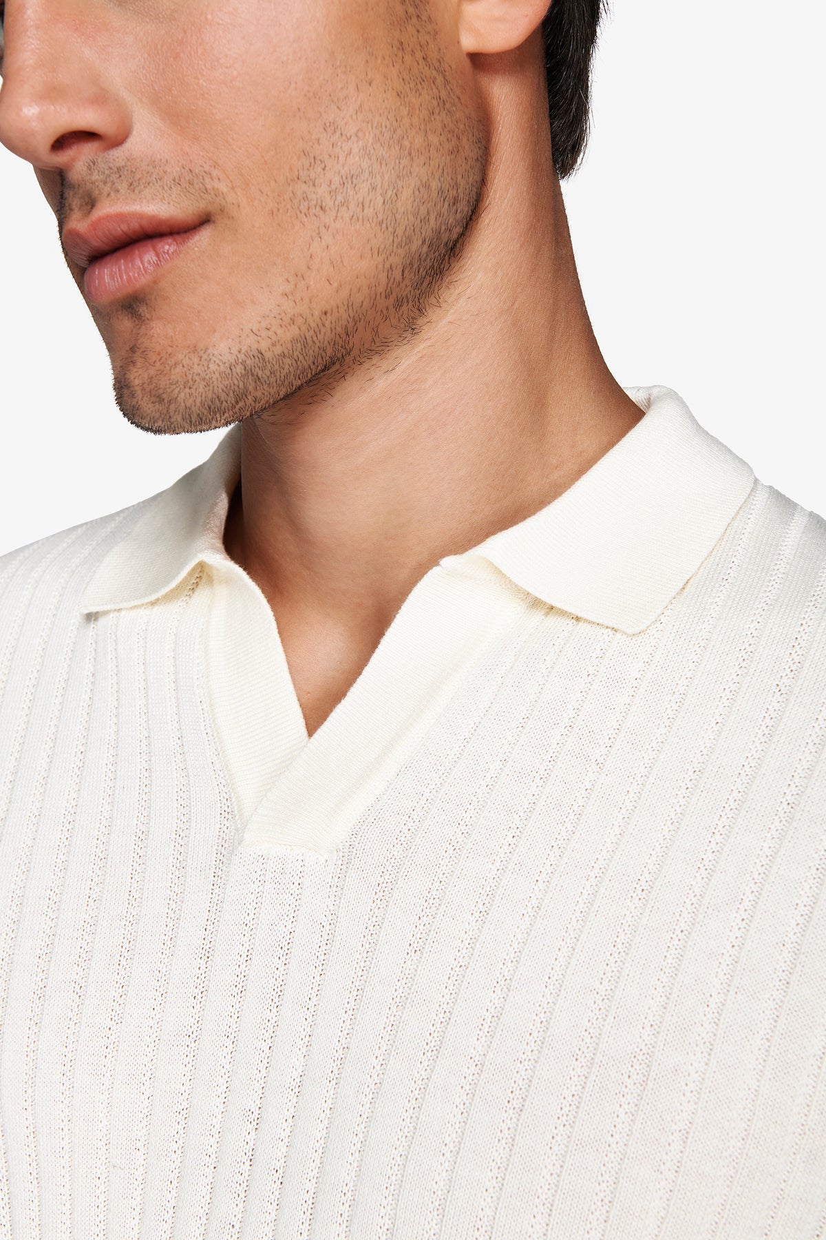 Polo in maglia collo aperto costa piatta panna