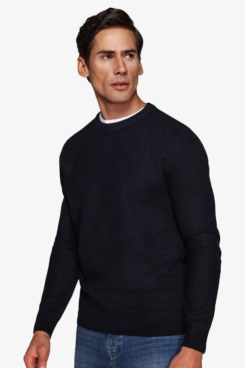 Pull bleu armuré à col rond au point de riz