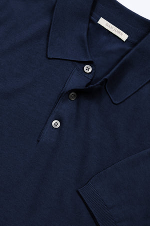 Polo de punto de color liso malva