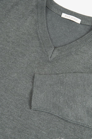 Green V-neck sweater
